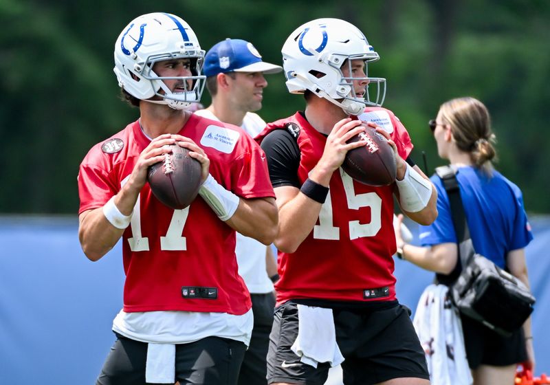 Jun 10, 2026; Indianapolis, IN, USA; Indianapolis Colts quarterback Daniel Jones (17) and Indianapolis Colts quarterback Riley Leonard (15) participate in a drill during minicamp at Indiana Farm Bureau Football Center. Mandatory Credit: Robert Goddin-Imagn Images