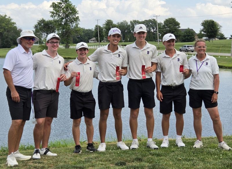 The Bloomington South boys golf team, from left, head coach Dustin Carver, Colton Watson, Easton Bellini, Carson Gady, Owen Wisley, Karl Bailey and assistant coach Kim Ellett celebrate after taking second at the Washington Regional on Thursday, June 11, 2026.