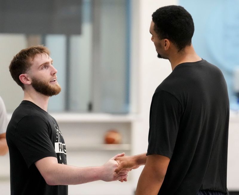 Braden Smith (left) greets Trey Kaufman-Renn after participating in an Indiana Pacers pre-draft workout Monday, June 15, 2026, at the Ascension St. Vincent Center in Indianapolis.