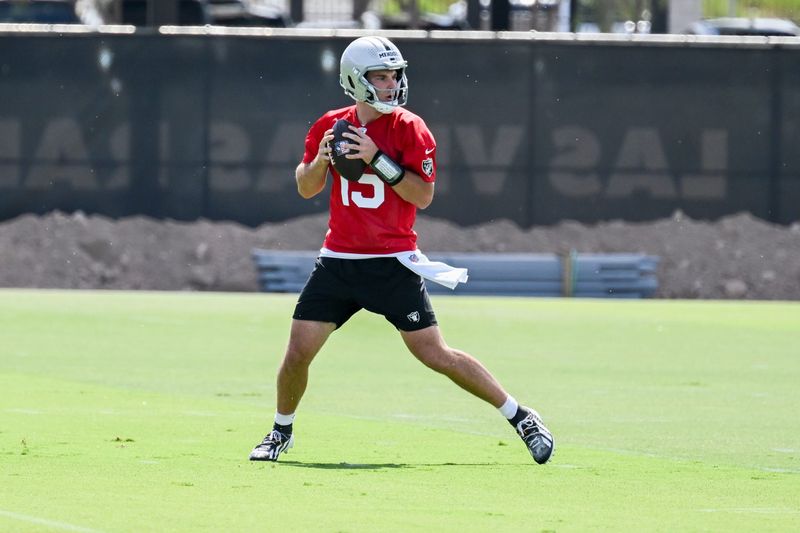 Jun 3, 2026; Henderson, NV, USA; Las Vegas Raiders quarterback Fernando Mendoza (15) runs a drill during organized team activities at Intermountain Health Performance Center. Mandatory Credit: Candice Ward-Imagn Images