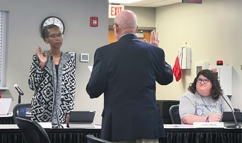 MCCSC board member Aja Jester was sworn in in 2024, as board member Ashley Pirani, right, looks on.