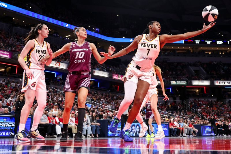 Indiana Fever center Aliyah Boston (7) rebounds the ball Tuesday, June 16, 2026, during the first half of a game at Gainbridge Fieldhouse in Indianapolis.