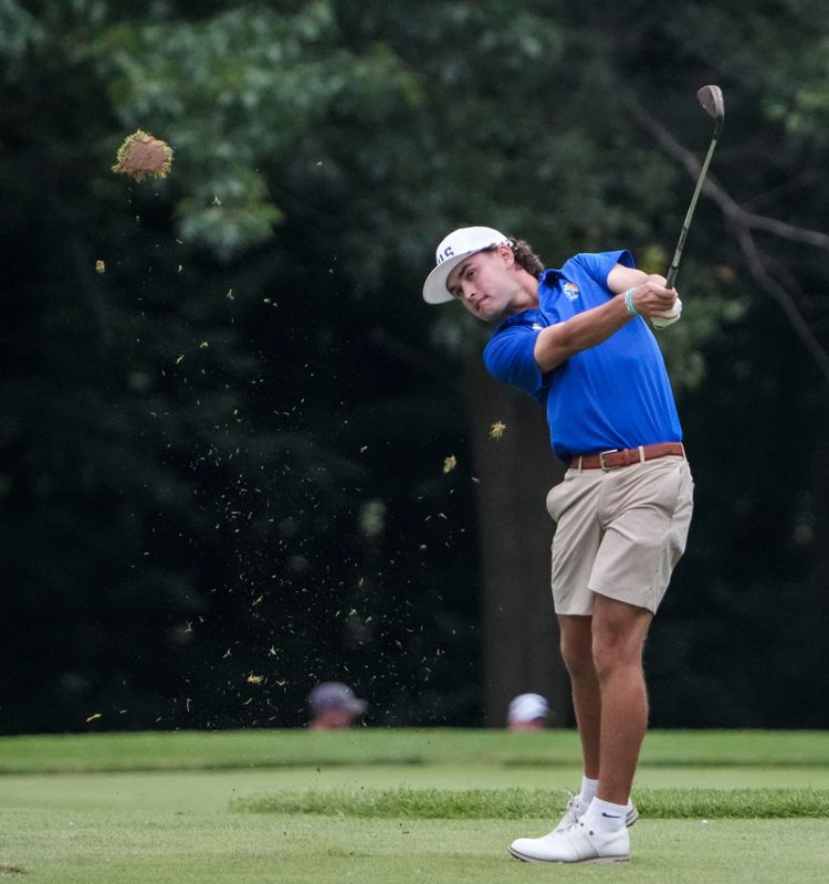 Castle’s Alexander Cook hits onto the 11th green Wednesday, June 17, 2026, during day two of the IHSAA boys golf state finals at Prairie View Golf Club in Carmel.