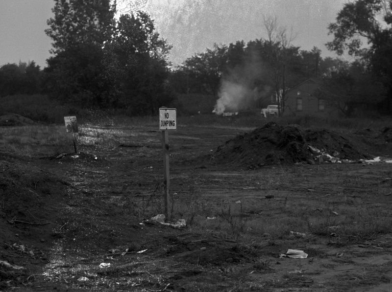In a Tribune photo from September 1963, a "No Dumping" sign stands in the midst of a debris-covered area of LaSalle Park.