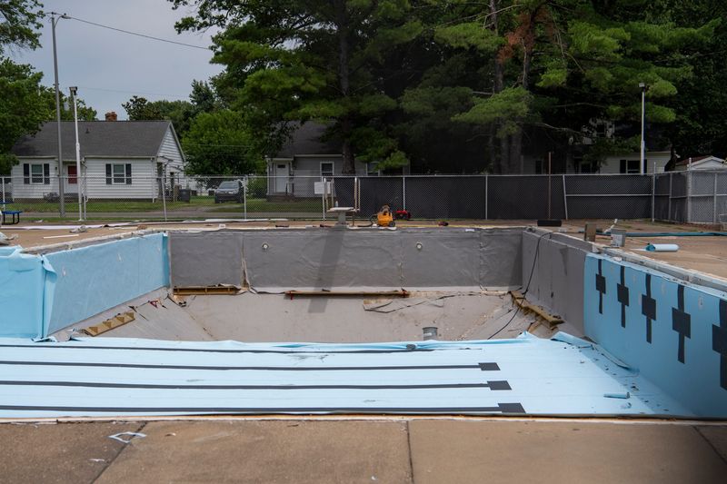 A new liner at Lorraine Park community swimming pool is installed in Wednesday, June 17, 2026.