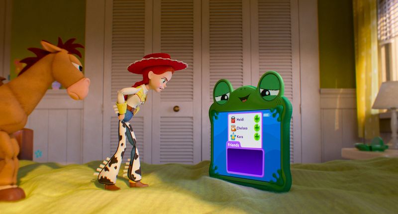 Jessie, (voiced by Joan Cusack, center left) and Lilypad (Greta Lee) have words in "Toy Story 5."