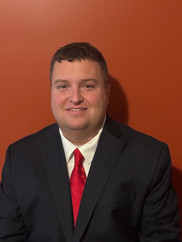 Former Plymouth Athletic Director Josh Troyer poses for a headshot.