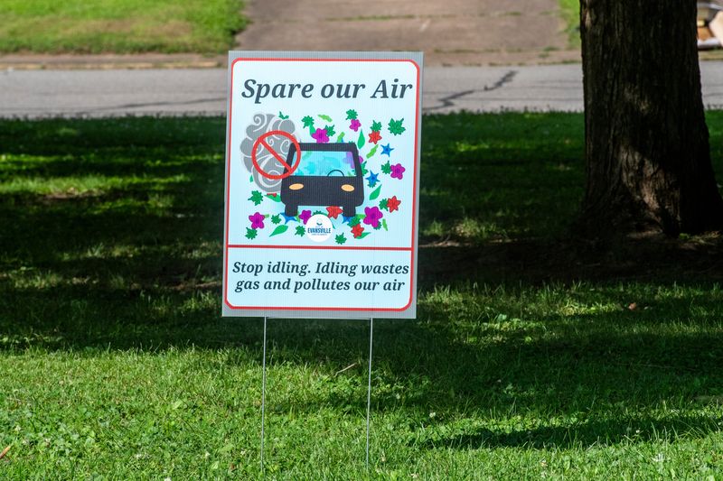 Anti-vehicle idling signs are seen in Lorraine Park in Evansville, Ind., Thursday, June 18, 2026.