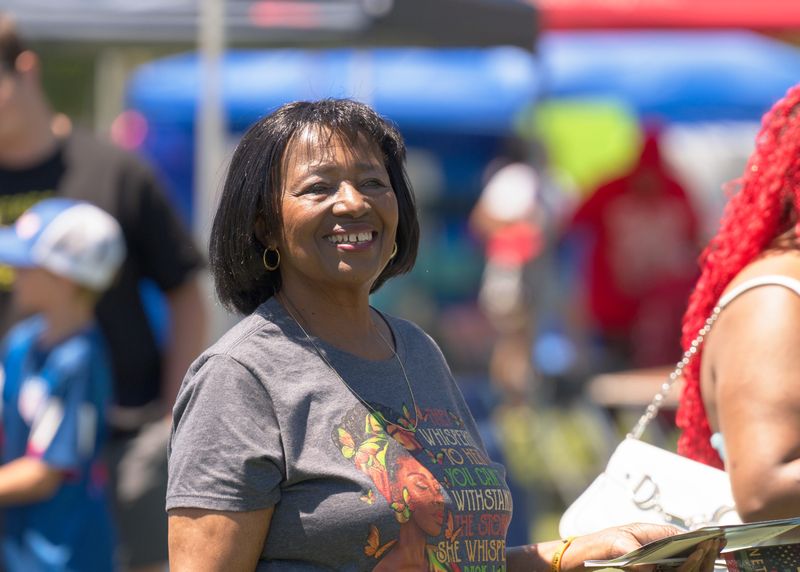 Betty Dunlap smiles at a local business vendor at the South Bend Chapter of the Indiana Black Expo’s annual Juneteenth celebration on June 20, 2026, at LaSalle Park in South Bend. 