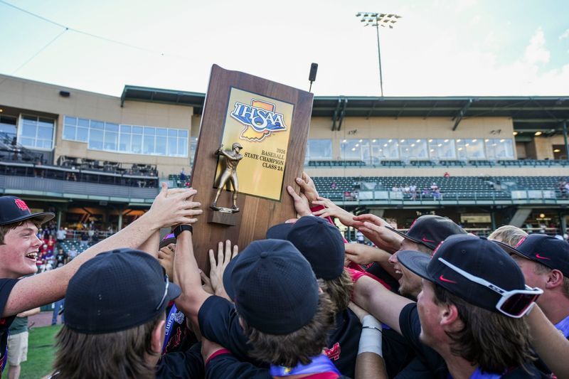 The Evansville Mater Dei Wildcats celebrate Saturday, June 20, 2026, after winning the IHSAA Class 2A baseball state championship at Victory Field in Indianapolis. The Evansville Mater Dei Wildcats defeated the Bluffton Tigers, 6-3.