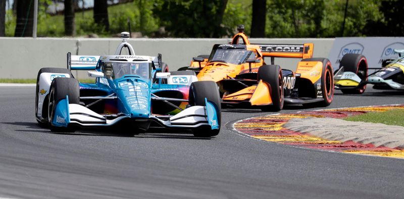 Josef Newgarden (2) leads a pack during IndyCar series warm ups at the XPEL Grand Prix at Road America, Sunday, June 21, 2026, at Elkhart Lake, Wis.