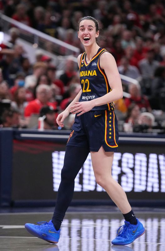 Indiana Fever guard Caitlin Clark (22) reacts to a foul Monday, June 22, 2026, during the game at Gainbridge Fieldhouse in Indianapolis. The Indiana Fever defeated the Phoenix Mercury, 86-77.