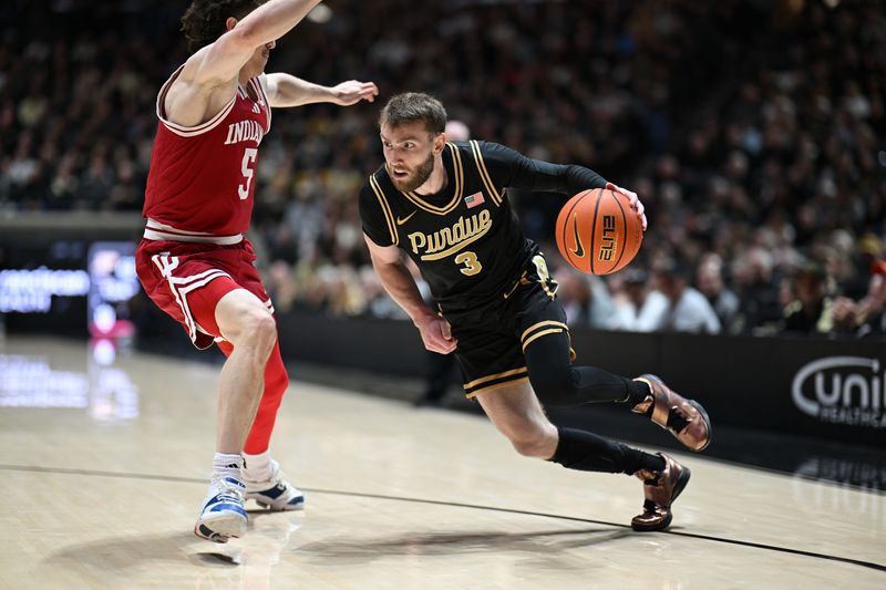 Feb 20, 2026; West Lafayette, Indiana, USA;  Purdue Boilermakers guard Braden Smith (3) drives against Indiana Hoosiers guard Conor Enright (5) during the second half at Mackey Arena. Mandatory Credit: Marc Lebryk-Imagn Images