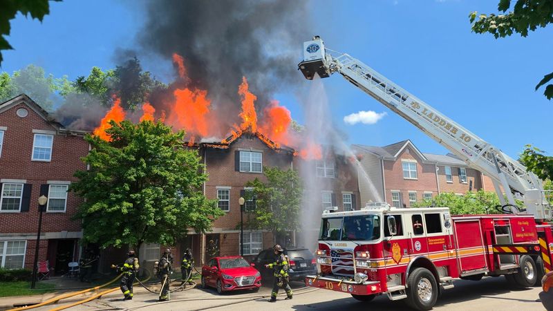 Members of the Indianapolis Fire Department respond to a fire that destroyed 12 apartments at the Villages at Mill Crossing on June 23, 2026.