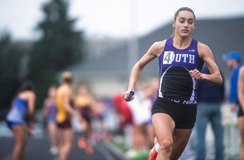 South's Ellie Barada runs her leg as South wins the 4 x 400 meter race during the IHSAA girl's sectional track meet at Bloomington High School South on Wednesday, May 20, 2026.