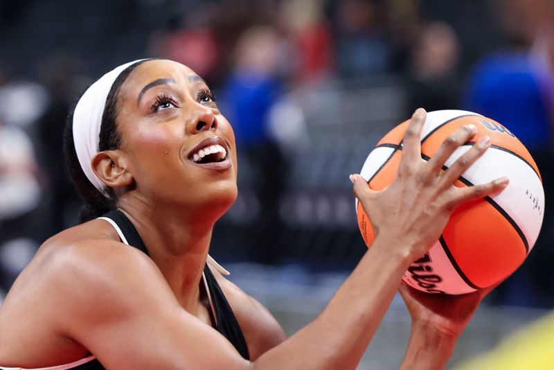 Indiana Fever forward Monique Billings (25) warms up Wednesday, June 24, 2026, before a game at Gainbridge Fieldhouse in Indianapolis.