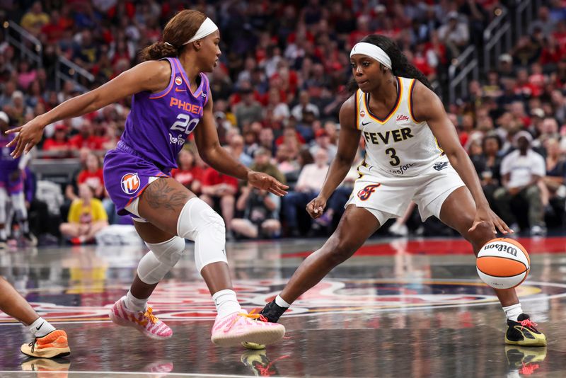 Indiana Fever guard Raven Johnson (3) runs a play against Phoenix Mercury guard Quionche Carter (20) on Wednesday, June 24, 2026, during the first half of a game at Gainbridge Fieldhouse in Indianapolis.