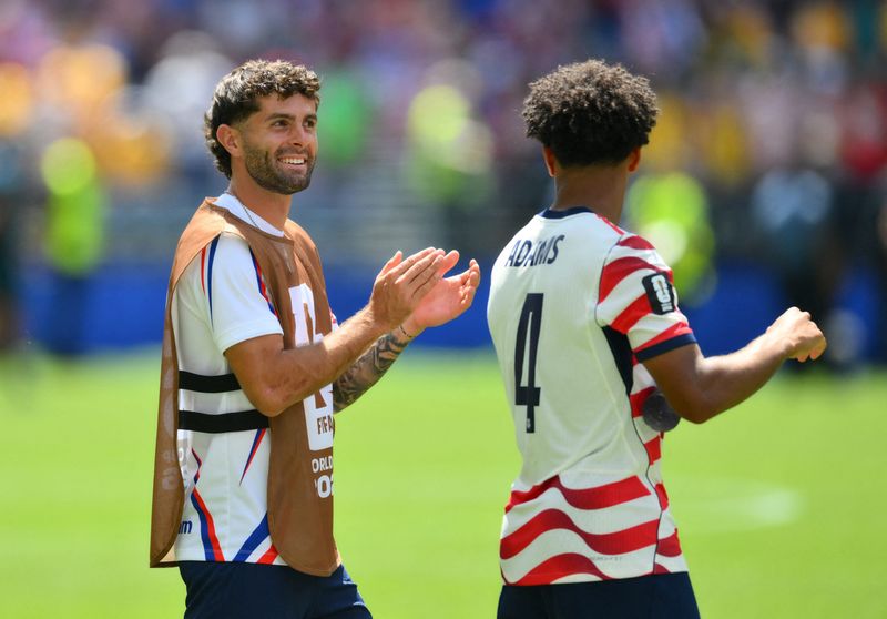 June 19, 2026; Seattle, Washington, U.S.; Christian Pulisic and Tyler Adams of the U.S. celebrate after the match.  Mandatory Credit: Steven Bisig-Imagn Images