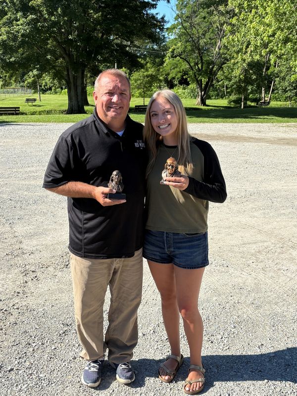 Henry County resident Rusty Conner and his daughter, Sara Richards, hold busts of the Founding Father they recently learned they were descendants of, Benjamin Franklin.
