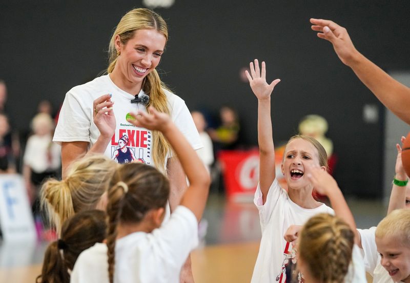 Indiana Fever guard Lexi Hull (10) smiles as all the students in the gym yell “I love Lexi!” On Sunday, June 28, 2026, during the Lexi Hull Basketball ProCamp at Aletto Family Sports Center in Carmel.