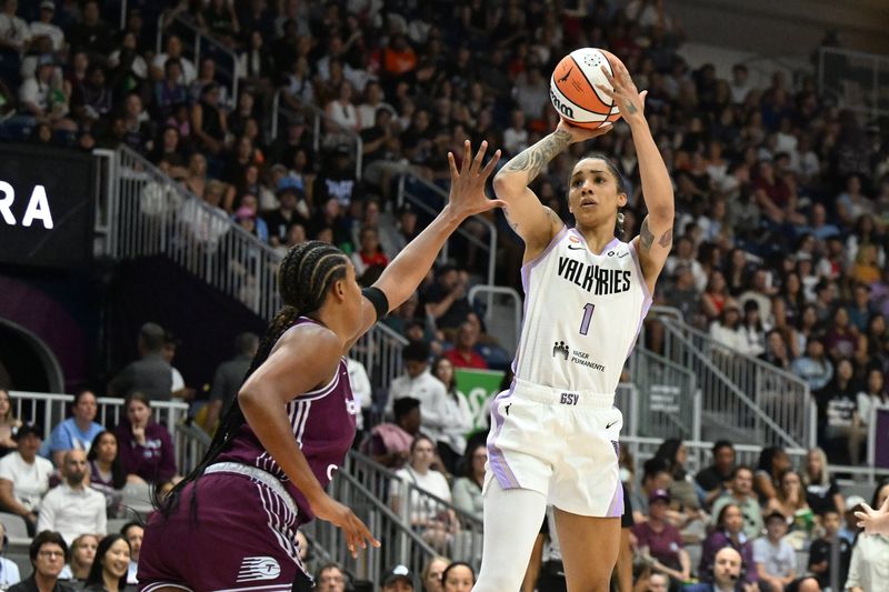 Golden State Valkyries guard Gabby Williams (1) shoots the ball over Toronto Tempo forward Nyara Sabally (8) in the first half at Coca-Cola Coliseum on July 8, 2026 in Toronto, Ontario.