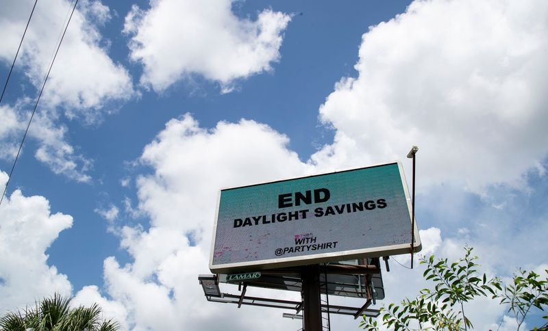 A billboard in Florida advocates for the end of daylight saving time.