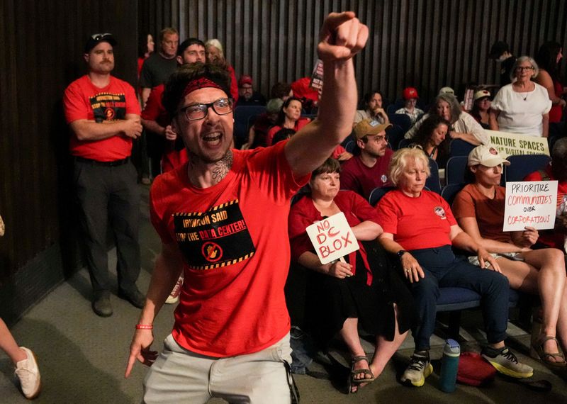 Mikey Hess, 31, reacts as the Metropolitan Development Commission approves a proposed DC BLOX data center campus Wednesday, July 15, 2026, at the Indianapolis City-County Building in downtown Indianapolis. Hess said he lives two miles from the proposed center.