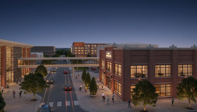 A rendering of the existing Bloomington Convention Center, right, the expansion, left, that is under construction, and the planned host hotel, in the background.