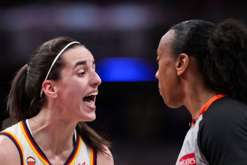 Indiana Fever guard Caitlin Clark (22) reacts to the action Wednesday, July 15, 2026, during the first half of a game at Gainbridge Fieldhouse in Indianapolis.