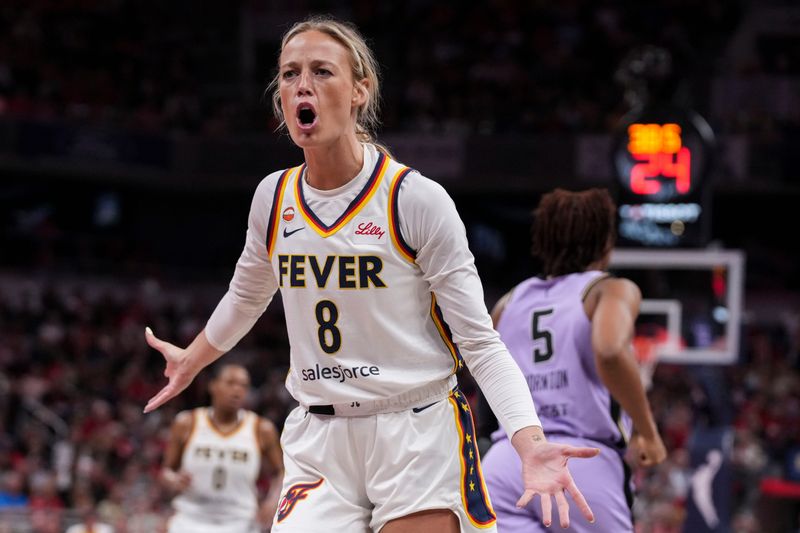 Indiana Fever guard Sophie Cunningham (8) reacts to the action Wednesday, July 15, 2026, during the second half of a game at Gainbridge Fieldhouse in Indianapolis. The Golden State Valkyries defeated the Indiana Fever, 88-75.