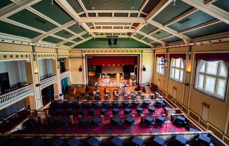Members of React (formerly Young Actors Theatre), rehearse in The Basile Theatre (formerly Athenaeum Theatre), originally opened in 1897, inside The Athenaeum (originally Das Deutsche Haus) at 401 E. Michigan St., on Thursday, July 17, 2026, in Indianapolis. The building is home to the Rathskeller restaurant, the historic Turner Gymnasium, Coat Check Coffee, the Christel DeHaan ArtSpace, React (formerly Young Actors Theatre), Indiana Writers Center, and the Urban Musical Theatre (formerly IPAC).