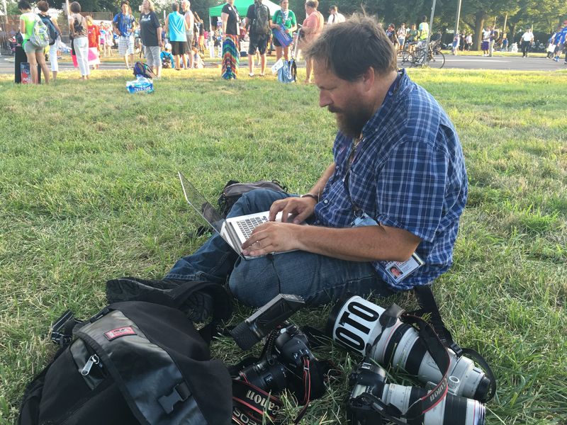 Bloomington-based journalist Jeremy Hogan works at an event.