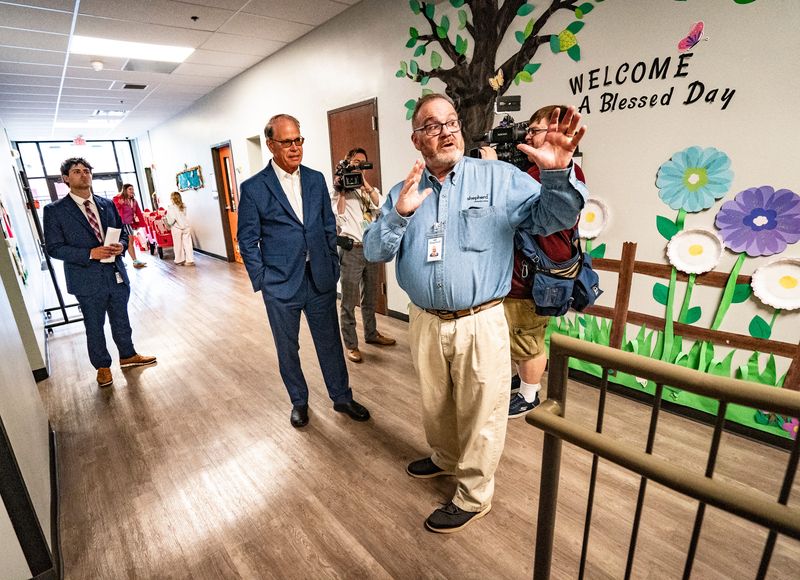 Executive Director of Shepherd Community Center, Jay Height, right, gives Indiana Governor Mike Braun a tour of the Shepherd Community's Minnie Hartmann Neighborhood Childcare facility on Tuesday, July 21, 2026, in Indianapolis.
