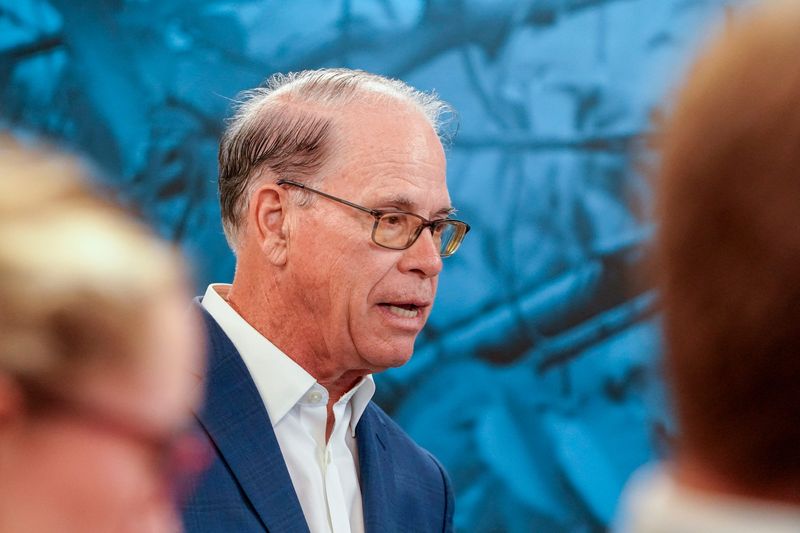 Indiana Governor Mike Braun speaks with moms at the Shepherd Community's Minnie Hartmann Neighborhood Childcare during a visit on Tuesday, July 21, 2026, in Indianapolis.