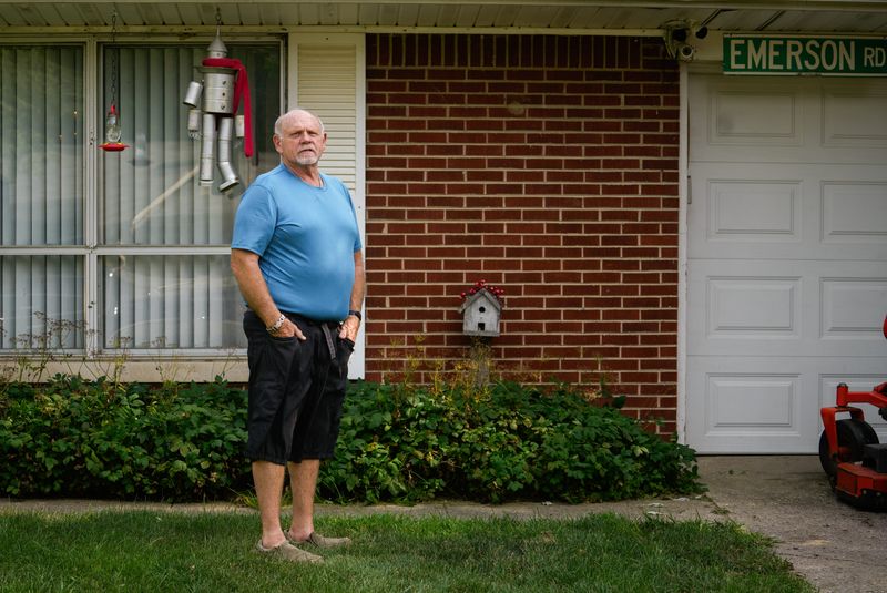 Charlie Demler poses for a portrait Tuesday, July 21, 2026, at his home in Carmel, Ind. Demler has been living in his home since 1980 but is considering selling and moving out of Carmel to somewhere with lower property taxes if the referendum passes.