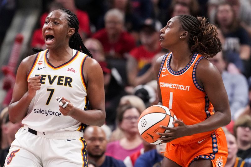 Indiana Fever center Aliyah Boston (7) yells on defense Wednesday, July 22, 2026, during a game at Gainbridge Fieldhouse in Indianapolis.