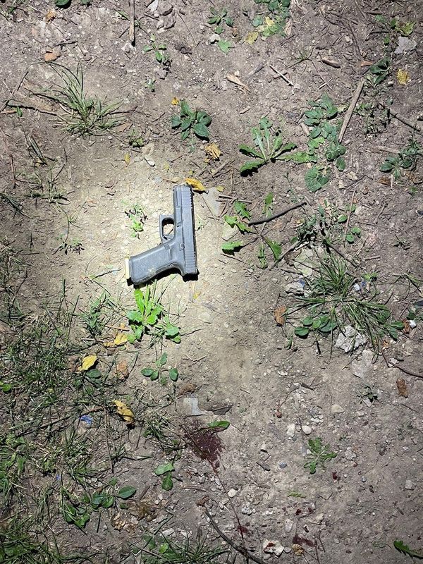 A firearm recovered from the scene of a shooting where two Indianapolis Metropolitan Police Department officers were injured and a suspect was killed late July 22, 2026, on East 37th Street.