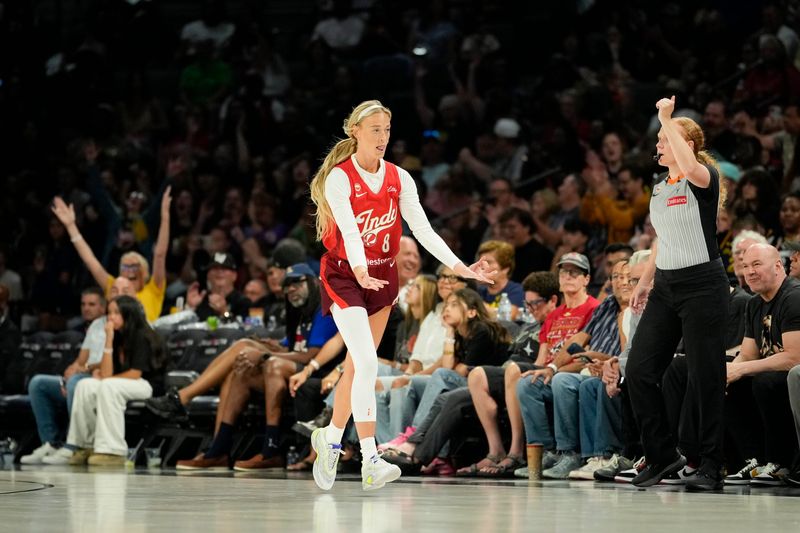 Indiana Fever guard Sophie Cunningham (8) reacts after scoring against the Las Vegas Aces.