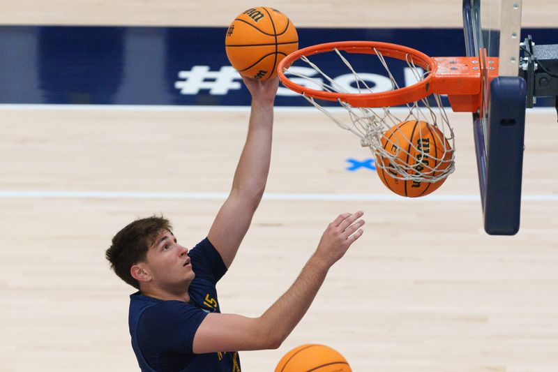 Center Tommy Ahneman drives to the basket during a Notre Dame men's basketball practice Monday, July 27, 2026, at Rolfs Athletics Hall in South Bend.
