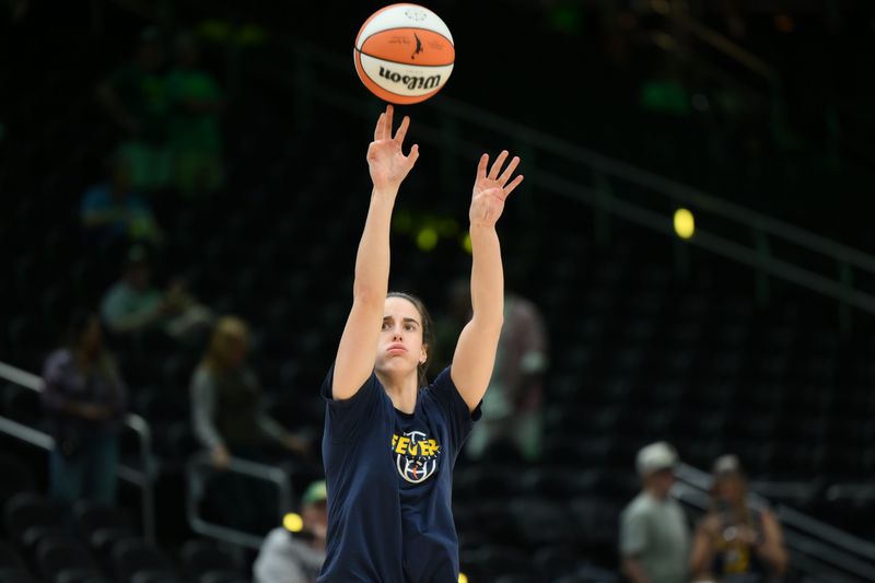 Jul 28, 2026; Seattle, Washington, USA; Indiana Fever guard Caitlin Clark (22) during warmups before the game against the Seattle Storm at Climate Pledge Arena.