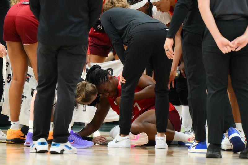Jul 28, 2026; Seattle, Washington, USA; Indiana Fever center Aliyah Boston (7) is tended to after an apparent injury during the first half against the Seattle Storm at Climate Pledge Arena.