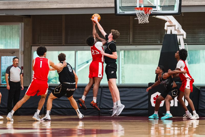 Purdue basketball's Daniel Jacobsen blocks a shot against Calgary during the Boilermakers' 79-48 victory on July 28, 2026.