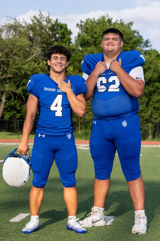 Bishop Chatard running back Danny Adams and offensive lineman Maddox Dwyer pose for a portrait Tuesday, July 28, 2026, at Brebeuf Jesuit Preparatory School in Indianapolis.