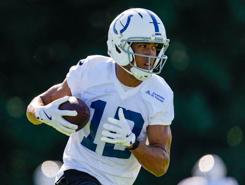 Indianapolis Colts wide receiver Nick Westbrook-Ikhine (12) rushes up the field Thursday, July 30, 2026, during the second of Colts Camp at Grand Park in Westfield.