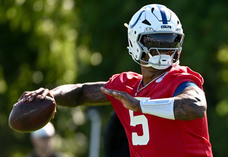 Jul 30, 2026; Westfield, IN, USA; Indianapolis Colts quarterback Anthony Richardson Sr. (5) participates in a drill on day two of training camp at Grand Park Sports Campus. Mandatory Credit: Robert Goddin-Imagn Images