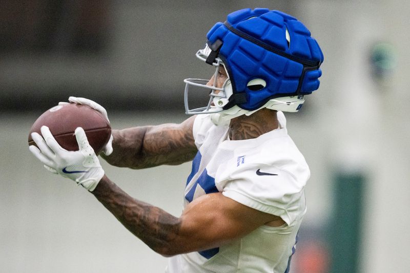 Indianapolis Colts running back Seth McGowan (20) catches a pass Saturday, Aug. 1, 2026, during day four of Indianapolis Colts training camp at Grand Park in Westfield.