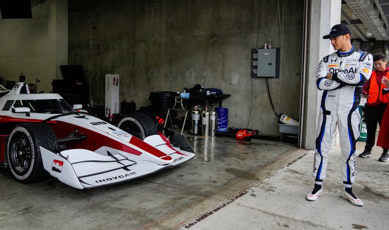 Chip Ganassi driver Alex Palou (10) waits in the garage Sunday, Aug. 2, 2026, ahead of testing the new IR28 Indy car on the road course at Indianapolis Motor Speedway.