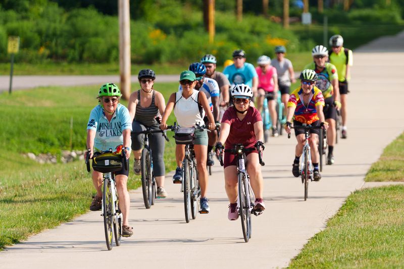 Cyclists ride the Indiana-Michigan River Valley Trail during a group ride hosted by Michiana Bicycle Association on Monday, Aug. 3, 2026, in South Bend.
