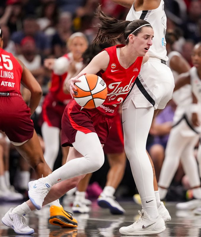 Indiana Fever guard Caitlin Clark (22) rushes up the court Thursday, Aug. 6, 2026, during the game at Gainbridge Fieldhouse in Indianapolis.