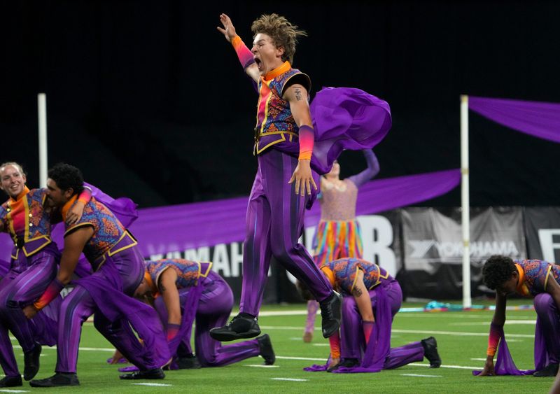 Members of The Academy, of Tempe, Ariz., perform during the Drum Corps International World Championship Semifinals on Friday, Aug. 7, 2026, at Lucas Oil Stadium in downtown Indianapolis.
